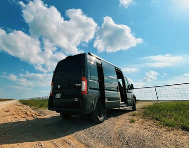 Black parked modern campervan