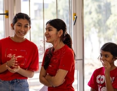 Students sharing a joyful moment at the aged home