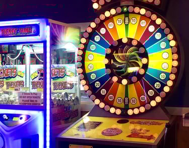 arcade game with wheel and bright lights