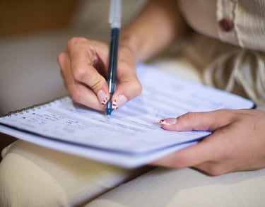 hands writing on notebok. mentoring