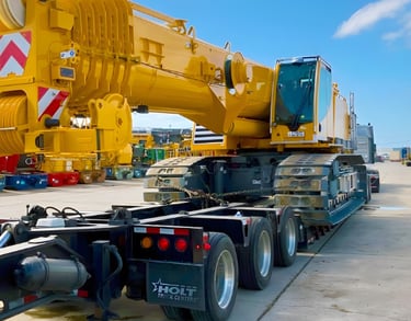 heavy equipment transport for commercial construction corridor projects