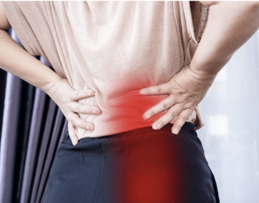 A person holding their lower back and hip showing areas of chronic back pain and sciatica relief needs.