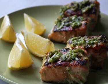 a plate of fresh salmon marinated with salted green onions
