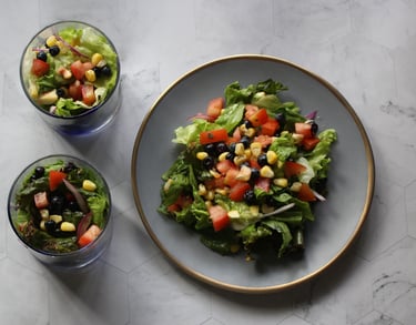 a salad with fresh romaine, red leaf lettuce, bicolor corn and blueberries