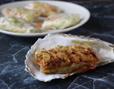 Oysters in Cabbage and Carrot Rice Rolls