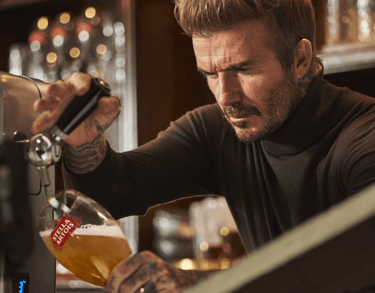 david beckham pouring stella artois beer
