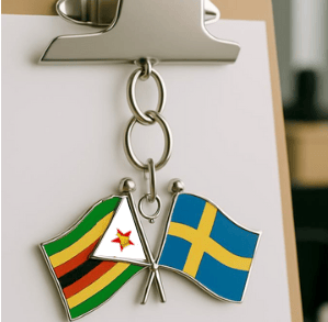 Key chain with Zimbabwean and Swedish flags side by side