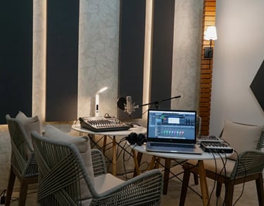 a laptop computer sitting on a table with a laptop on it