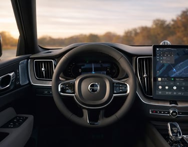 Interior do Volvo XC60 2026 híbrido com painel digital e central multimídia com Google integrado