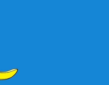 a banana peely banana sitting on top of a blue sky
