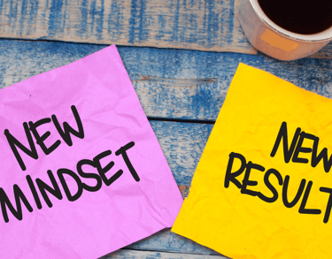 a cup of coffee and a cup of coffee on a table