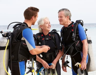 a group of people standing in front of a body of water