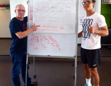 rob hamilton and sean lai kok seng senior tennis pro who I helped win 5 tournaments in 12 months