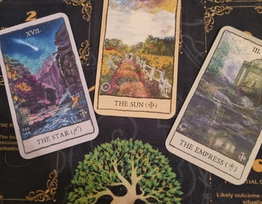 three major acana tarot cards, the star, the sun, the lovers
