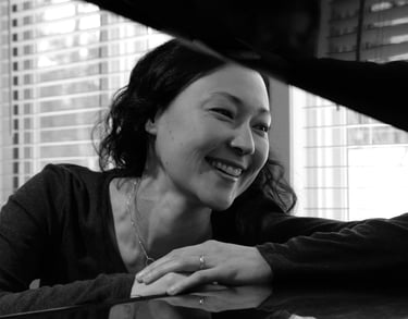 Composer and Educator Jen Smith Lanthier at a grand piano