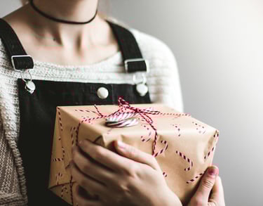 Girl is holding a gift