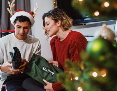 Couple is unpacking gifts