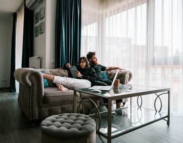 Couple is resting on the coach