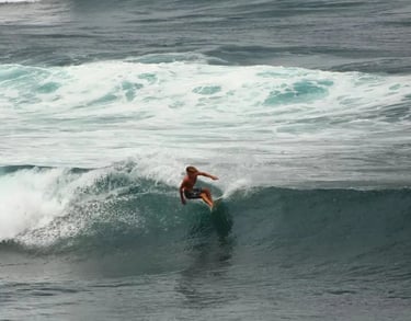surfer at popoyo beach on a wave