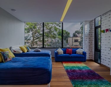 a living room with a couch and a television