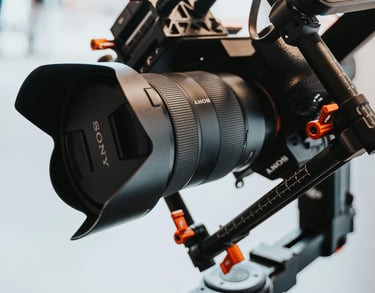 a camera mounted on a tripod with a camera