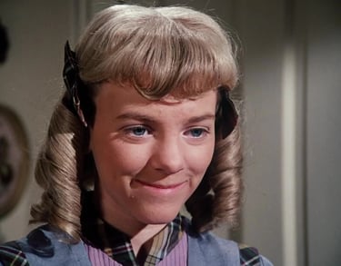 Alison Arngrim as Nellie Oleson from Little House on the Prairie