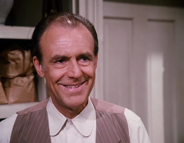 Richard Bull as Nels Oleson from Little House on the Prairie
