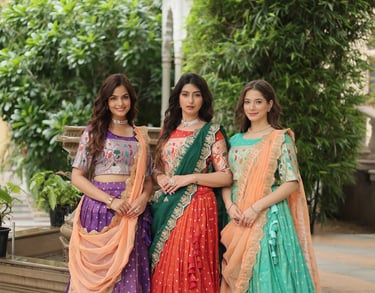 Three women in colorful Bridesmaid Lehenga