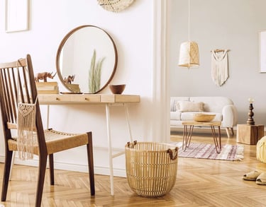 a room with a mirror and a chair