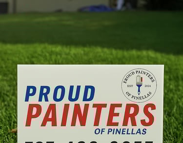 Branded yard sign from Proud Painters of Pinellas on job site