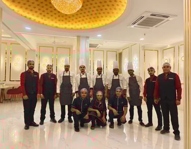 a group of chefs and their staff members