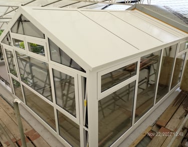 Modern UPVC conservatory with glass roof extending Auckland home living space, New Zealand