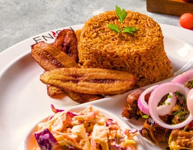 Jollof rice with plantain and salad