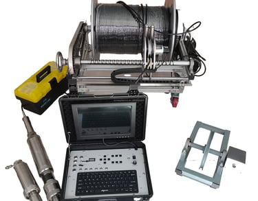 Industrial borehole camera system with waterproof inspection probe, cable winch, and monitor control unit.