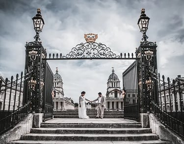 wedding couple standing on the old royal navy college steps in greenwich