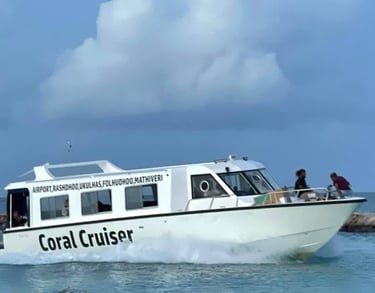 The Coral Cruiser speedboat ferry transports passengers across turquoise waters in the Maldives.
