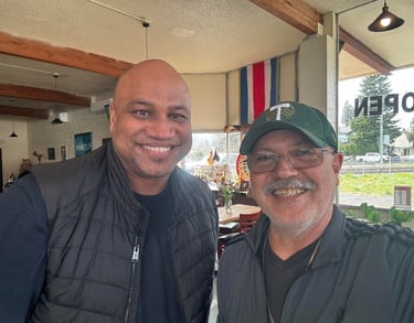 Mayor of Gresham Travis Stovall and restaurant owner Jorge Zuniga at Las Brasas 