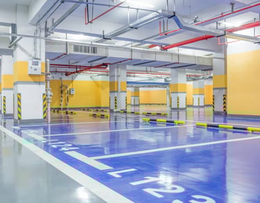 Aplicación de pintura epoxi para suelo de garaje en oficina de Indautxu, Bilbao
