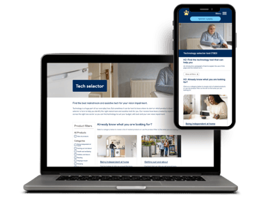 A laptop and smartphone displaying a responsive website design for assistive technology and vision impairment resources.