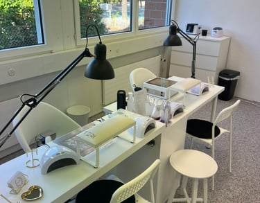 a desk with a lamp and a lamp on it