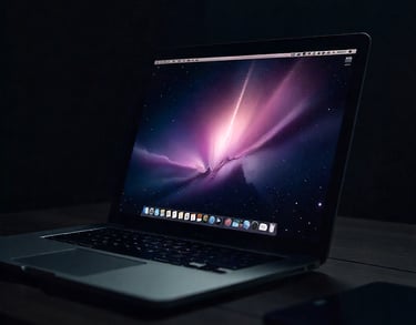 a laptop computer sitting on a table with a cell phone