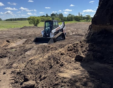 skid-steer-moving-dirt.jpg