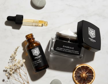 Yeshua Skin collagen and retinol serum with oatmeal moisturizer on a marble surface.