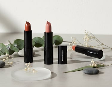 a variety of lipsticks on a table