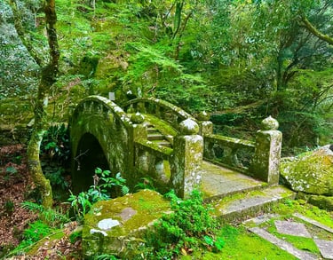 Taki no Kannon statue beside a small waterfall in Nagasaki
