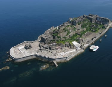 Gunkanjima (Battleship Island) with abandoned concrete buildings in Nagasaki
