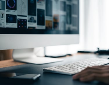 a person's hand is typing on a keyboard