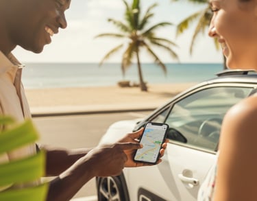 LocXperience Car rental agent advising a customer on a Martinique tourist itinerary