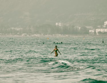 Albania beaches, digital nomad Europe, woman in ocean, remote-friendly destinations