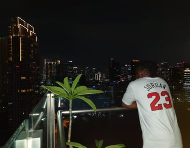 a person looking out to the city